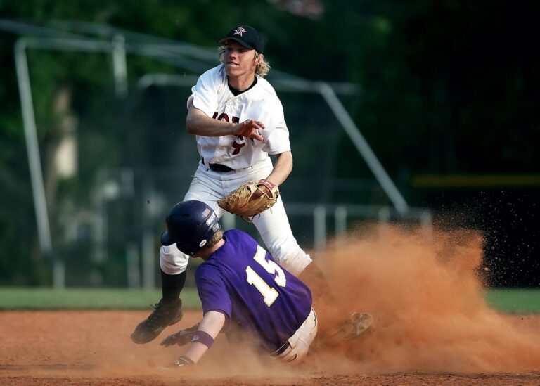 Dramatic baseball scene with players in action during a game.